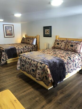 Imagen de la habitación del Hotel Island Park Lodge. Foto 11