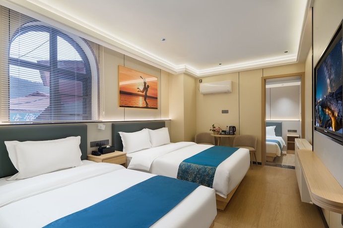 Imagen de la habitación del Hotel Island Time, Jiujiang. Foto 2