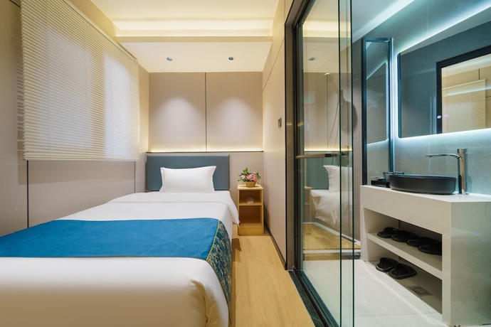 Imagen de la habitación del Hotel Island Time, Jiujiang. Foto 3