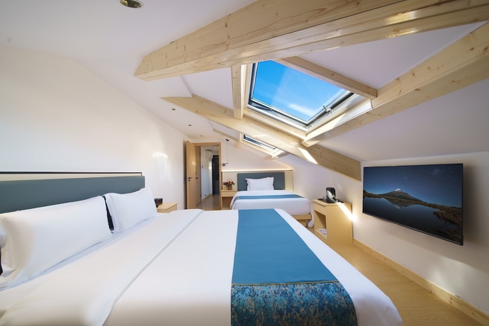 Imagen de la habitación del Hotel Island Time, Jiujiang. Foto 7