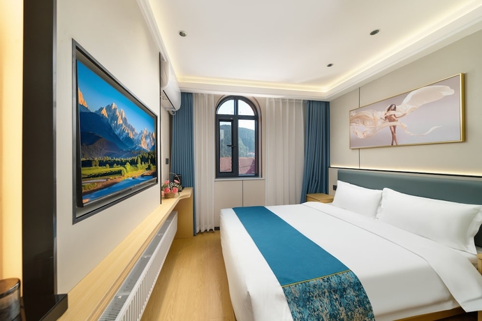 Imagen de la habitación del Hotel Island Time, Jiujiang. Foto 8