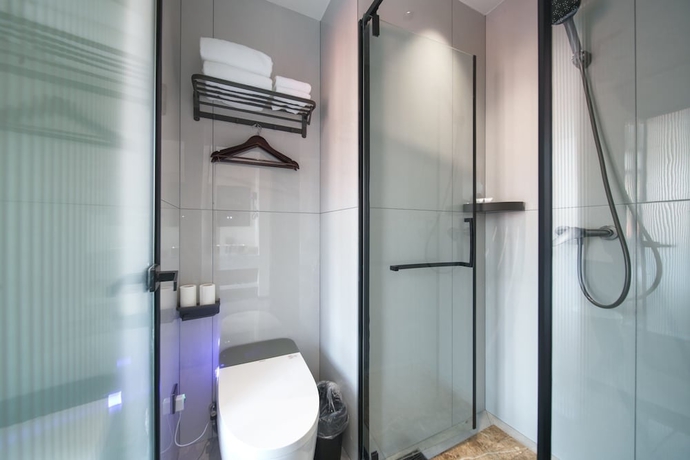 Imagen de la habitación del Hotel Island Time, Jiujiang. Foto 9