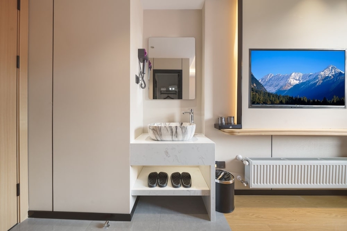 Imagen de la habitación del Hotel Island Time, Jiujiang. Foto 11