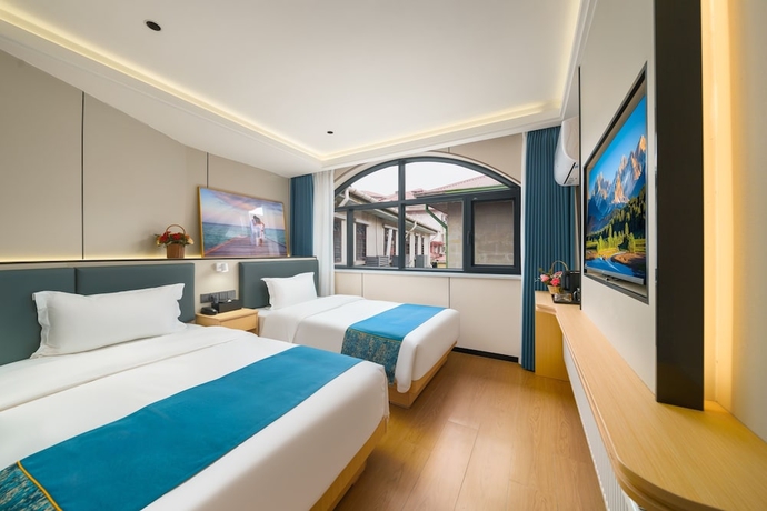 Imagen de la habitación del Hotel Island Time, Jiujiang. Foto 12