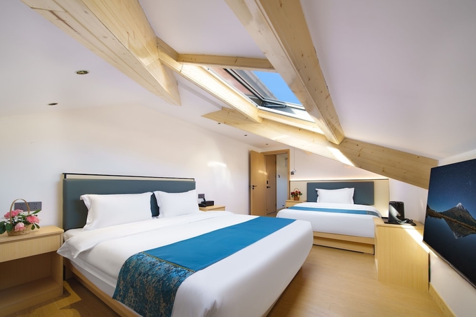 Imagen de la habitación del Hotel Island Time, Jiujiang. Foto 14