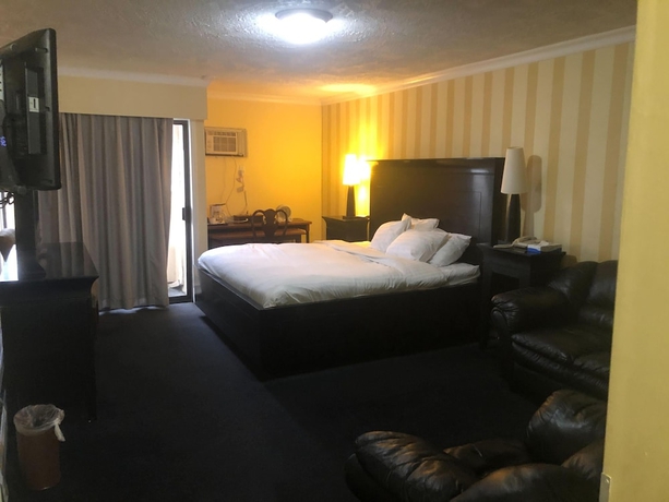 Imagen de la habitación del Hotel Island Travel Inn. Foto 3