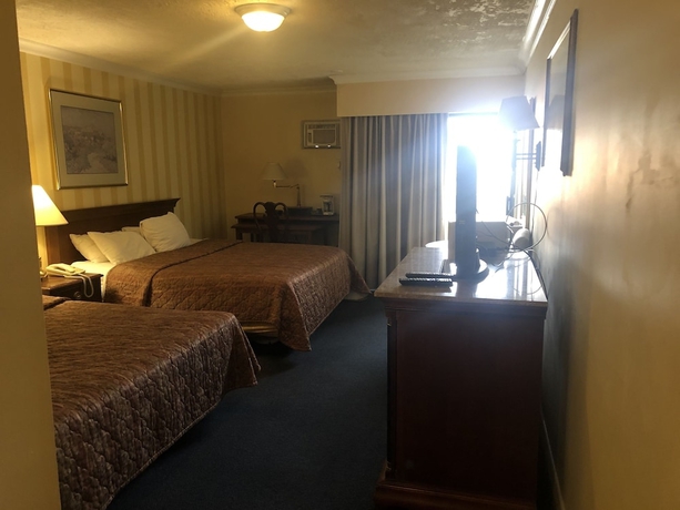 Imagen de la habitación del Hotel Island Travel Inn. Foto 8