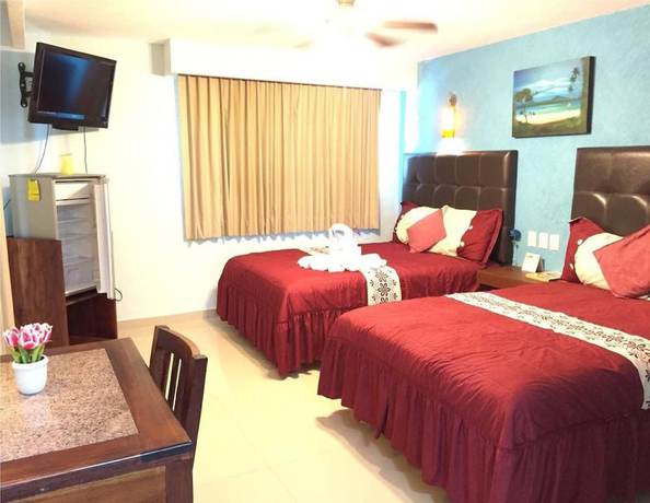 Imagen de la habitación del Hotel Isle&ntilde;o, Isla Mujeres. Foto 4