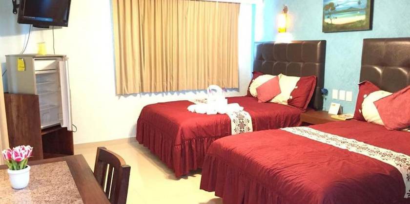 Imagen de la habitación del Hotel Isle&ntilde;o, Isla Mujeres. Foto 6