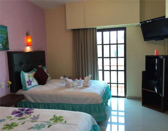 Imagen de la habitación del Hotel Isle&ntilde;o, Isla Mujeres. Foto 7