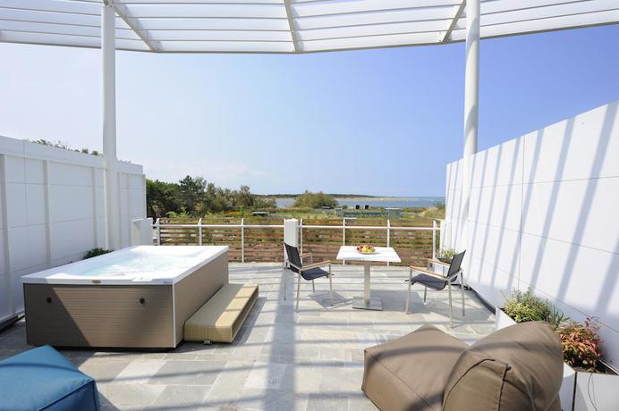 Imagen de la habitación del Hotel Isola Di Albarella Capo Nord. Foto 4