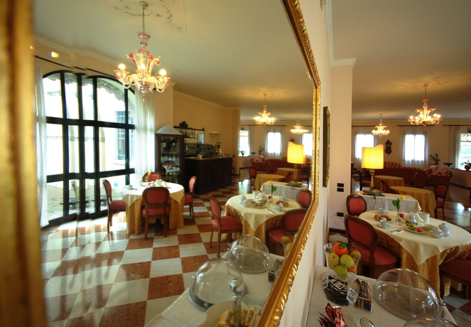 Imagen del bar/restaurante del Hotel Isola Di Caprera. Foto 2