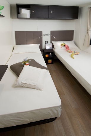 Imagen de la habitación del Hotel Isola dei Gabbiani - Land of Water. Foto 12