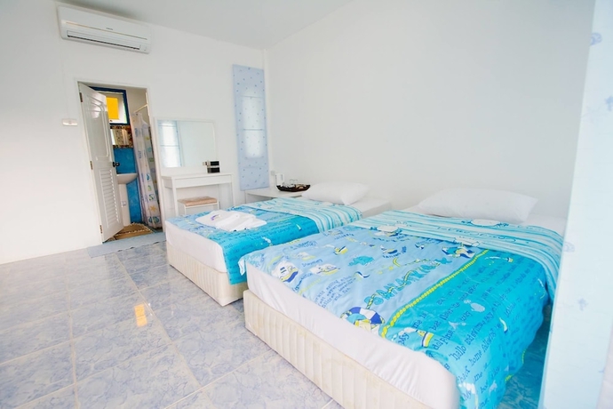 Imagen de la habitación del Hotel Issara Beach Resort. Foto 6