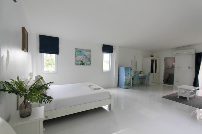 Imagen de la habitación del Hotel Issara Beach Resort. Foto 11