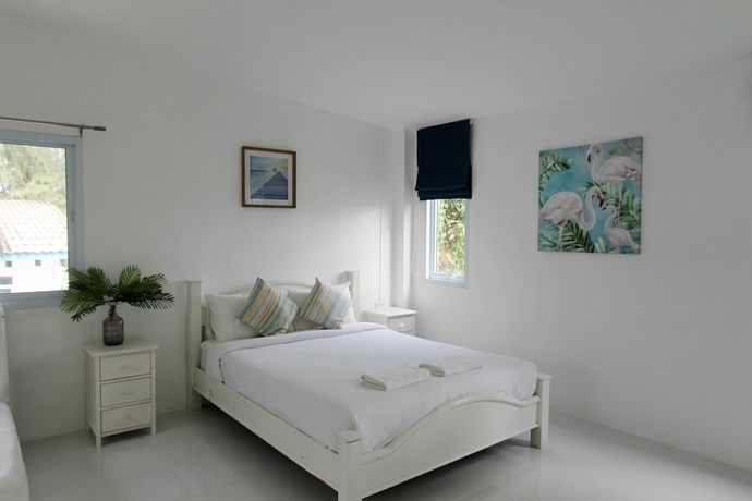 Imagen de la habitación del Hotel Issara Beach Resort. Foto 14