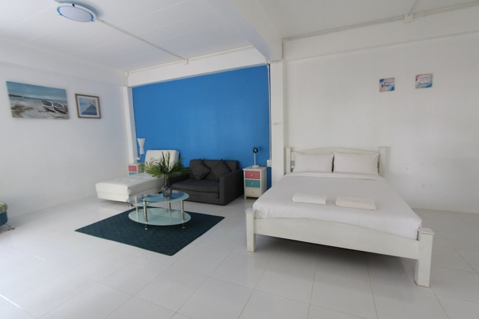 Imagen de la habitación del Hotel Issara Beach Resort. Foto 15