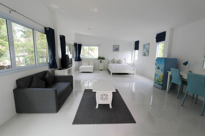 Imagen de la habitación del Hotel Issara Beach Resort. Foto 16