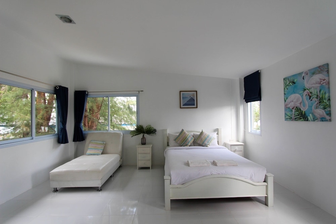 Imagen de la habitación del Hotel Issara Beach Resort. Foto 17