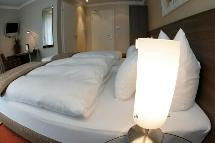 Imagen de la habitación del Hotel Isselhorster Landhaus. Foto 13