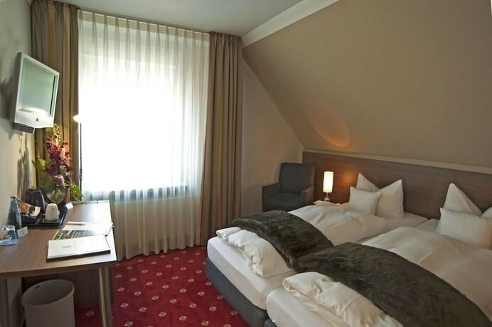 Imagen de la habitación del Hotel Isselhorster Landhaus. Foto 22