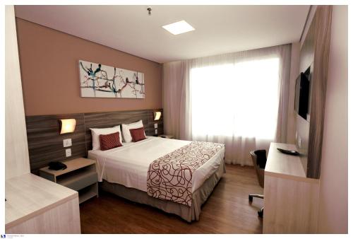 Imagen de la habitación del Hotel It Itabira. Foto 7