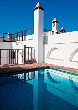 Imagen de la piscina del Hotel Itaca Sevilla By Soho Boutique. Foto 15