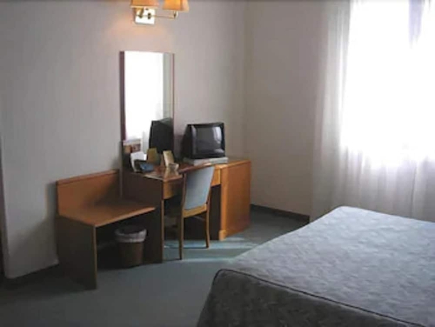 Imagen de la habitación del Hotel Italia, Ravenna. Foto 11