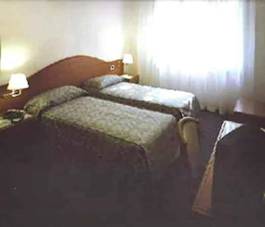 Imagen de la habitación del Hotel Italia, Ravenna. Foto 12