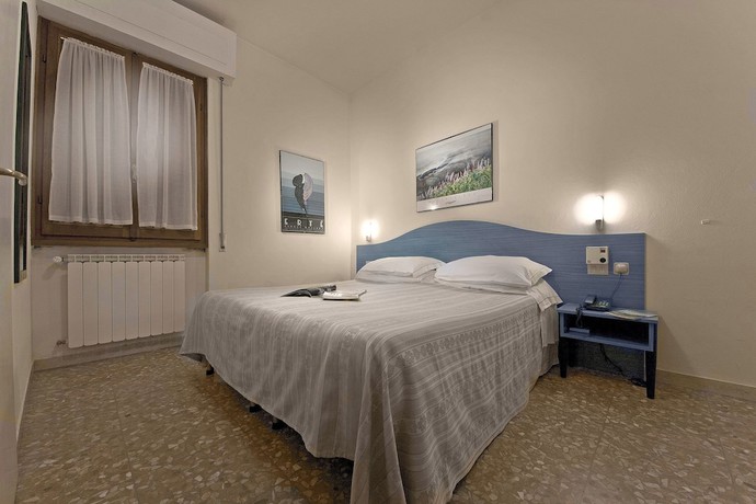 Imagen de la habitación del Hotel Italia Ristorante Pizzeria. Foto 11