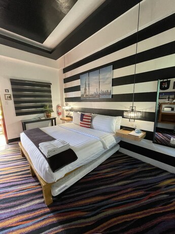 Imagen de la habitación del Hotel Italy Condotel Darasa. Foto 30