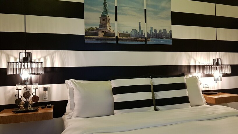 Imagen de la habitación del Hotel Italy Condotel Darasa. Foto 32