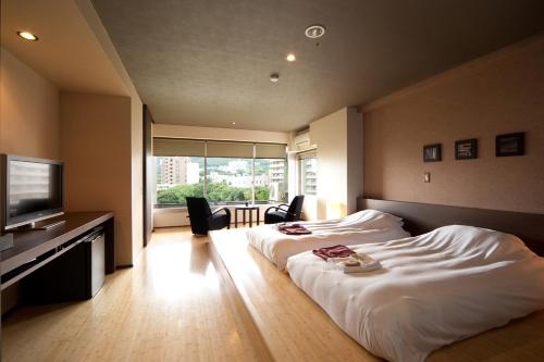 Imagen de la habitación del Hotel Ito Yukitei. Foto 8