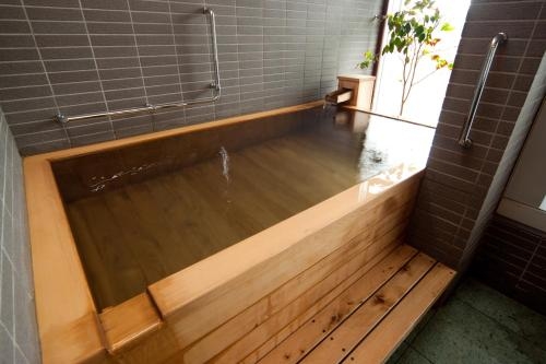 Imagen de la habitación del Hotel Ito Yukitei. Foto 9