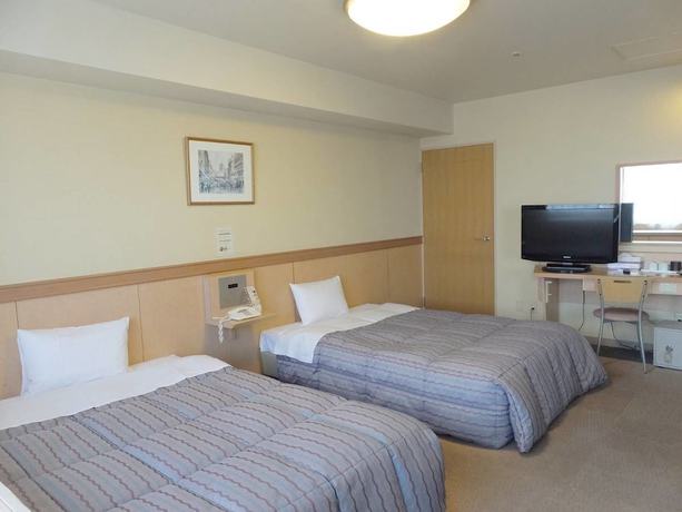 Imagen de la habitación del Hotel Itoen Atamikan. Foto 8