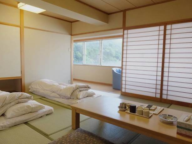 Imagen de la habitación del Hotel Itoen Atamikan. Foto 10