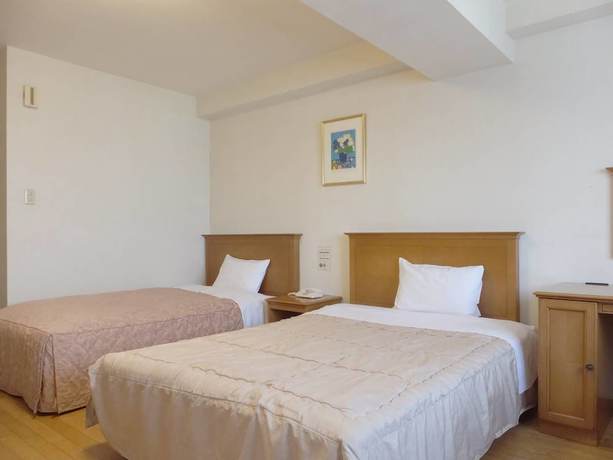 Imagen de la habitación del Hotel Itoen Atamikan. Foto 11