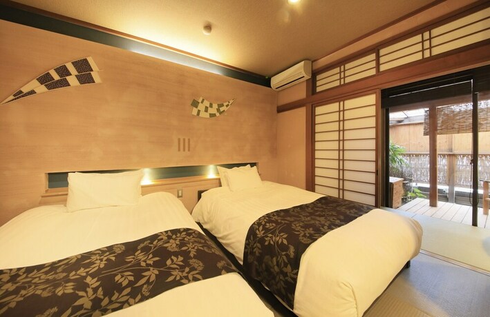 Imagen de la habitación del Hotel Itoyanagi Koyado Yuwa. Foto 16