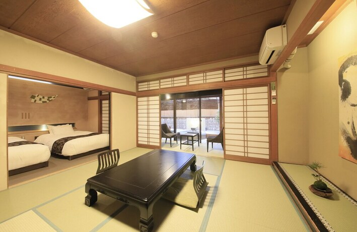 Imagen de la habitación del Hotel Itoyanagi Koyado Yuwa. Foto 19