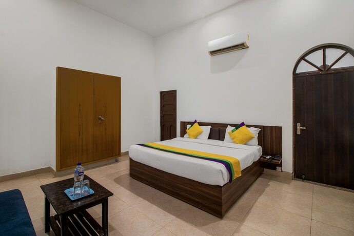 Imagen de la habitación del Hotel Itsy By Treebo - Om Pushp Residency. Foto 17