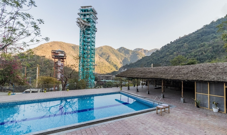 Imagen de la piscina del Hotel Itsy By Treebo - Paddler Zone. Foto 19