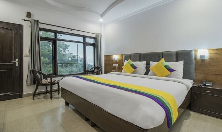 Imagen de la habitación del Hotel Itsy By Treebo - Peak View. Foto 17