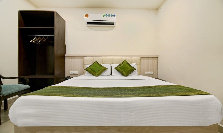 Imagen de la habitación del Hotel Itsy By Treebo - Solitaire. Foto 9