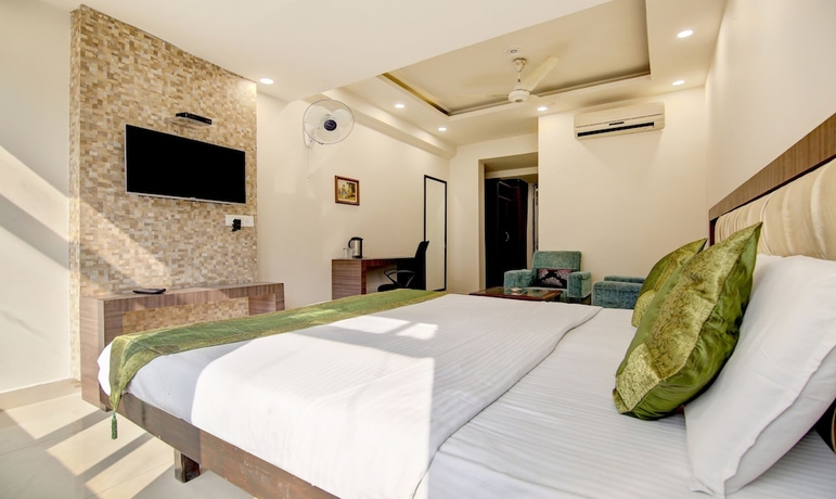 Imagen de la habitación del Hotel Itsy By Treebo - Solitaire. Foto 11