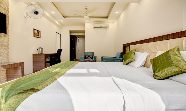 Imagen de la habitación del Hotel Itsy By Treebo - Solitaire. Foto 12