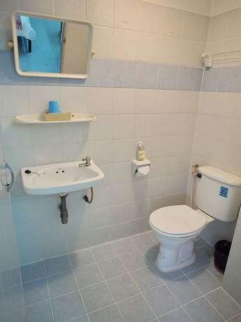 Imagen de la habitación del Hotel Ittipol Apartment. Foto 6