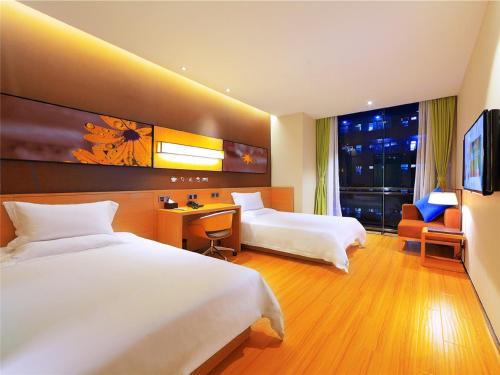 Imagen de la habitación del Hotel Iu Xi'an Fangzhicheng Station Tangdu Hospita. Foto 3