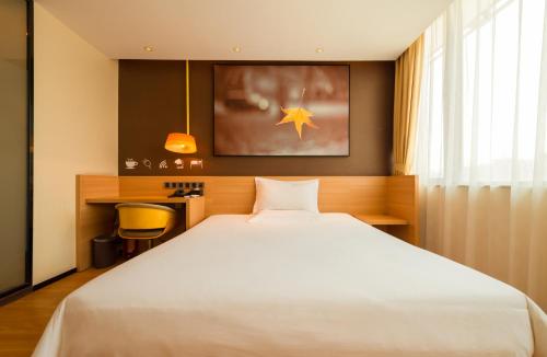 Imagen de la habitación del Hotel Iu Xi'an Fangzhicheng Station Tangdu Hospita. Foto 4