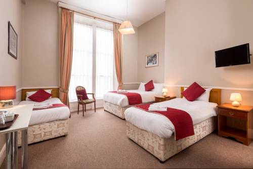 Imagen de la habitación del Hotel Iveagh Lodge. Foto 2