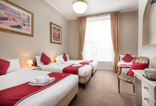 Imagen de la habitación del Hotel Iveagh Lodge. Foto 4